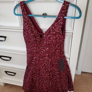 Red holiday dress. Brand new with tags. Size 7 youth